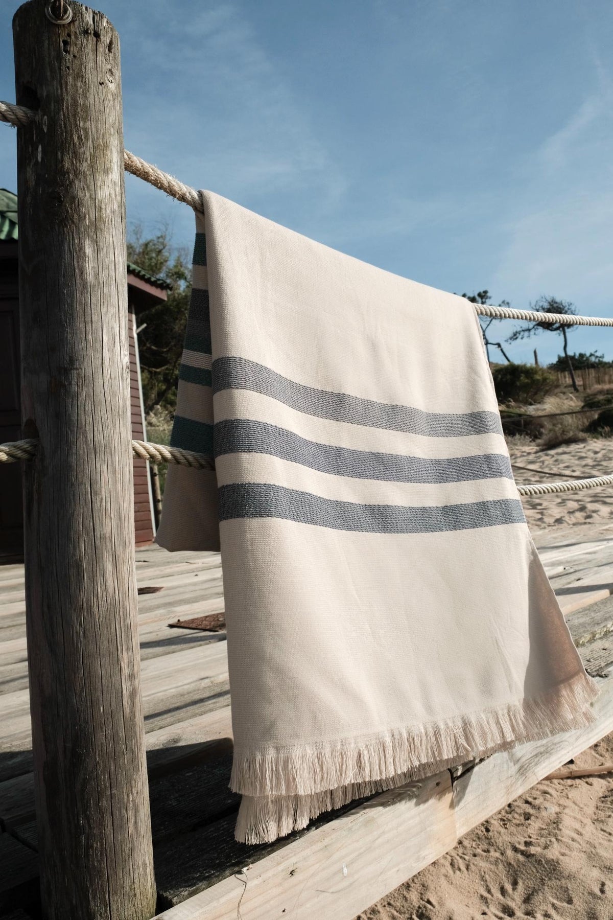 Mia Zia - TipyLinge de Plage Haut de Gamme - Fouta Handdoek - Het thema &quot;Tipy&quot; Ficelle achtergrond