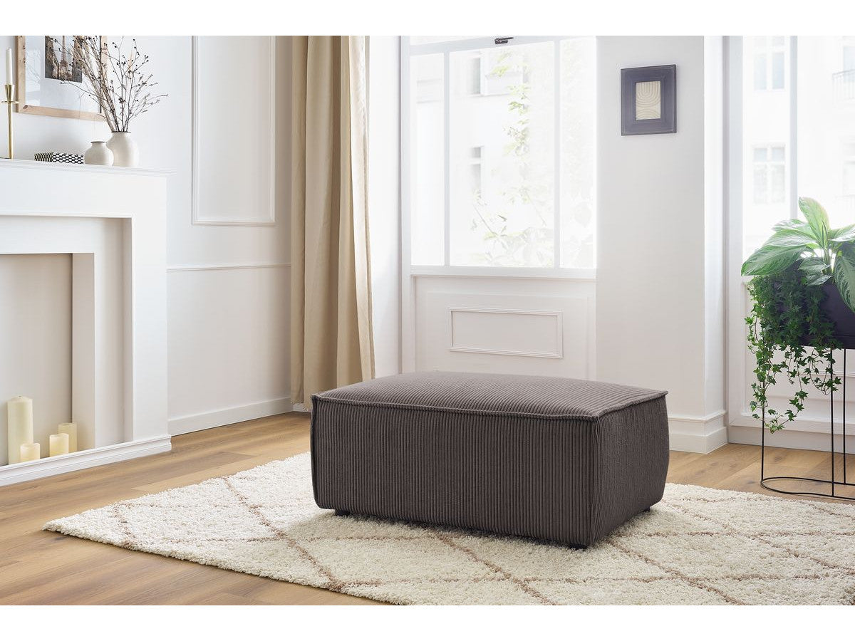 Compacte poef NIHAD ribfluweel