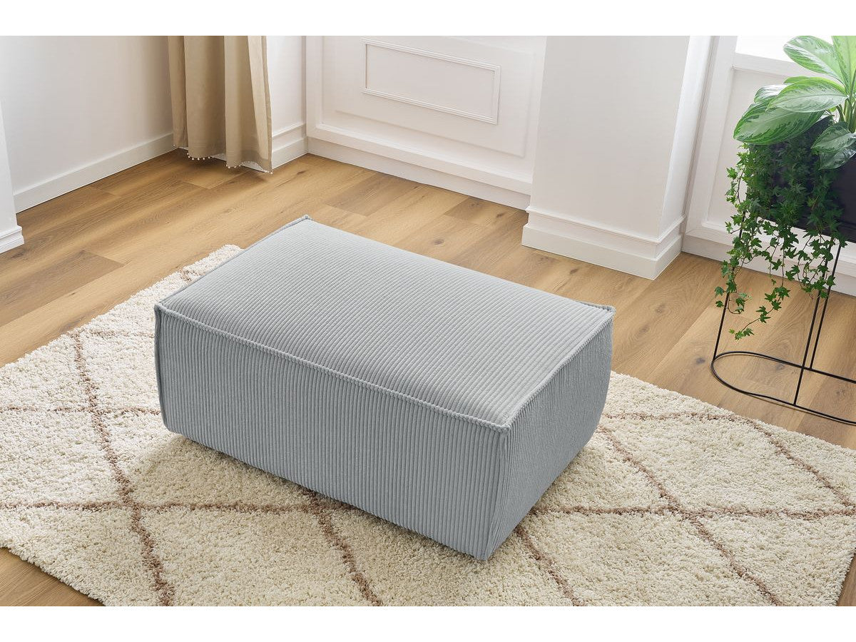 Compacte poef NIHAD ribfluweel