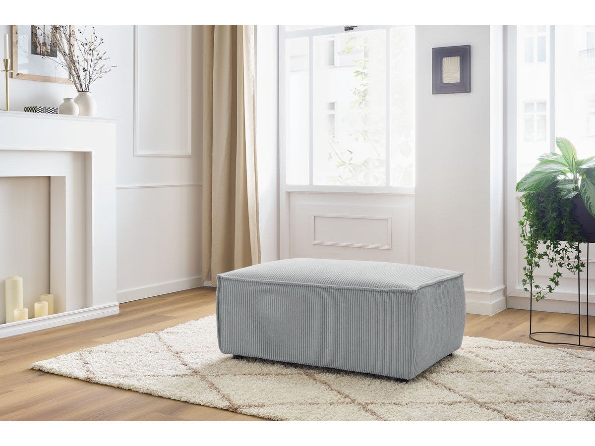 Compacte poef NIHAD ribfluweel