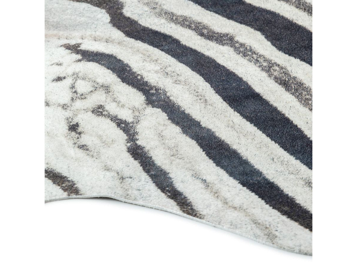 ZELIE dierenhuid-effect tapijt met zebrapatroon
